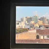 Picture of a skyline seen through a window